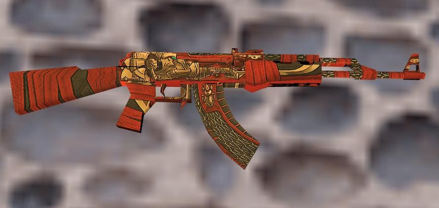 A close-up of the AK-47 Anubis skin model in Counter-Strike 1.6, featuring vibrant red and gold Egyptian-themed designs.