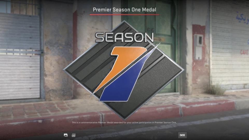 The Counter-Strike 2 Premier Season One Medal, featuring a diamond-shaped badge with a blue and orange 'Season 1' design, awarded for participation in CS2 Premier Season One.